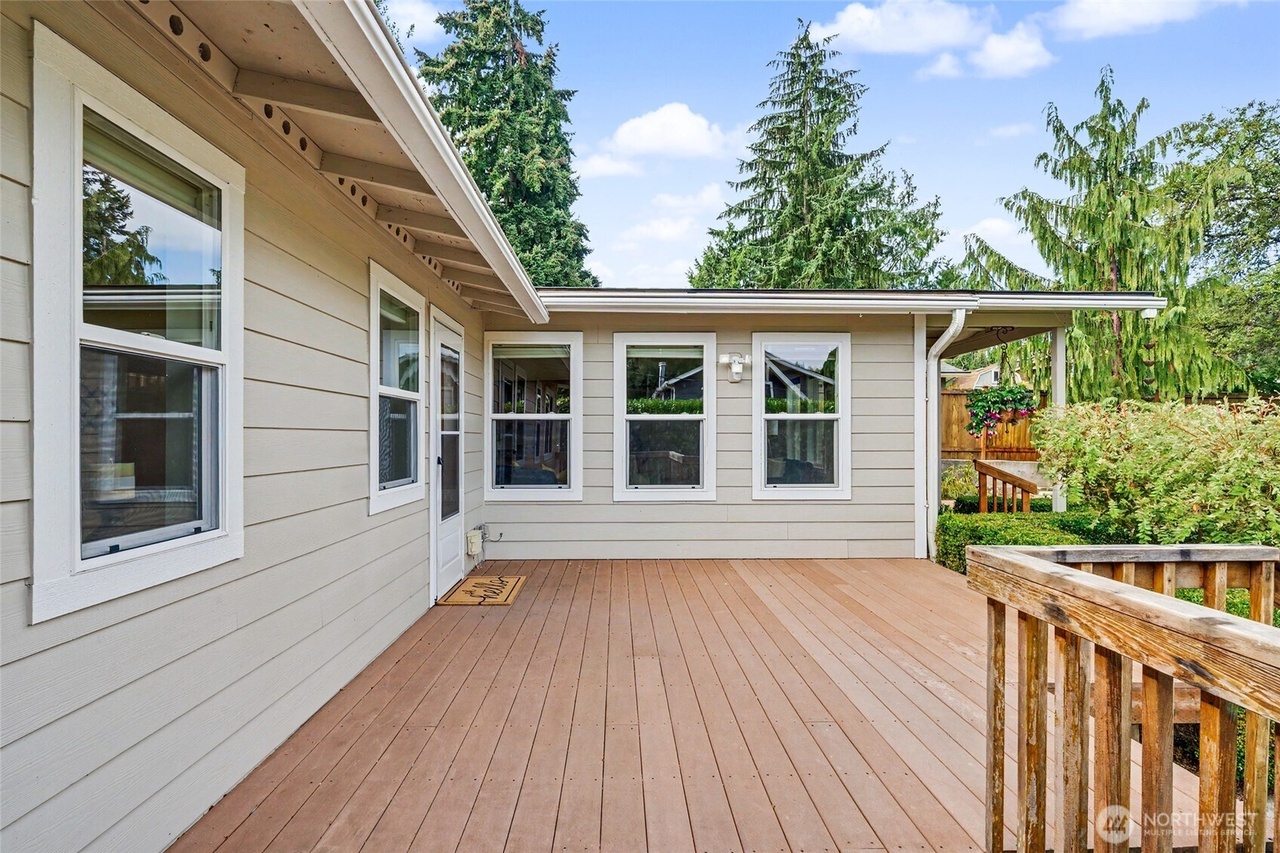 Trex deck and landscaped walkway beside the home